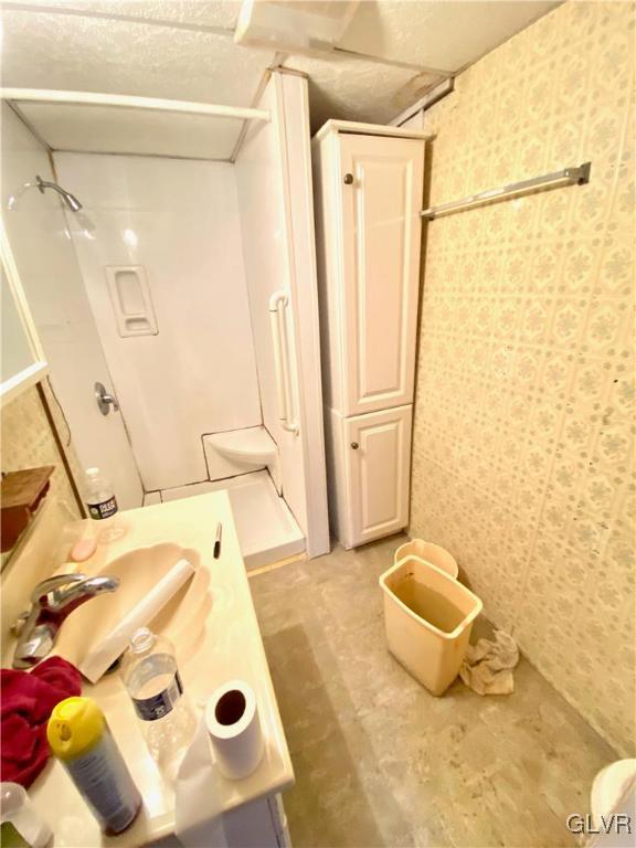 682 Washington Boulevard Bangor, PA 18013 - Photo 10 of 21 a bathroom with a sink toilet and shower