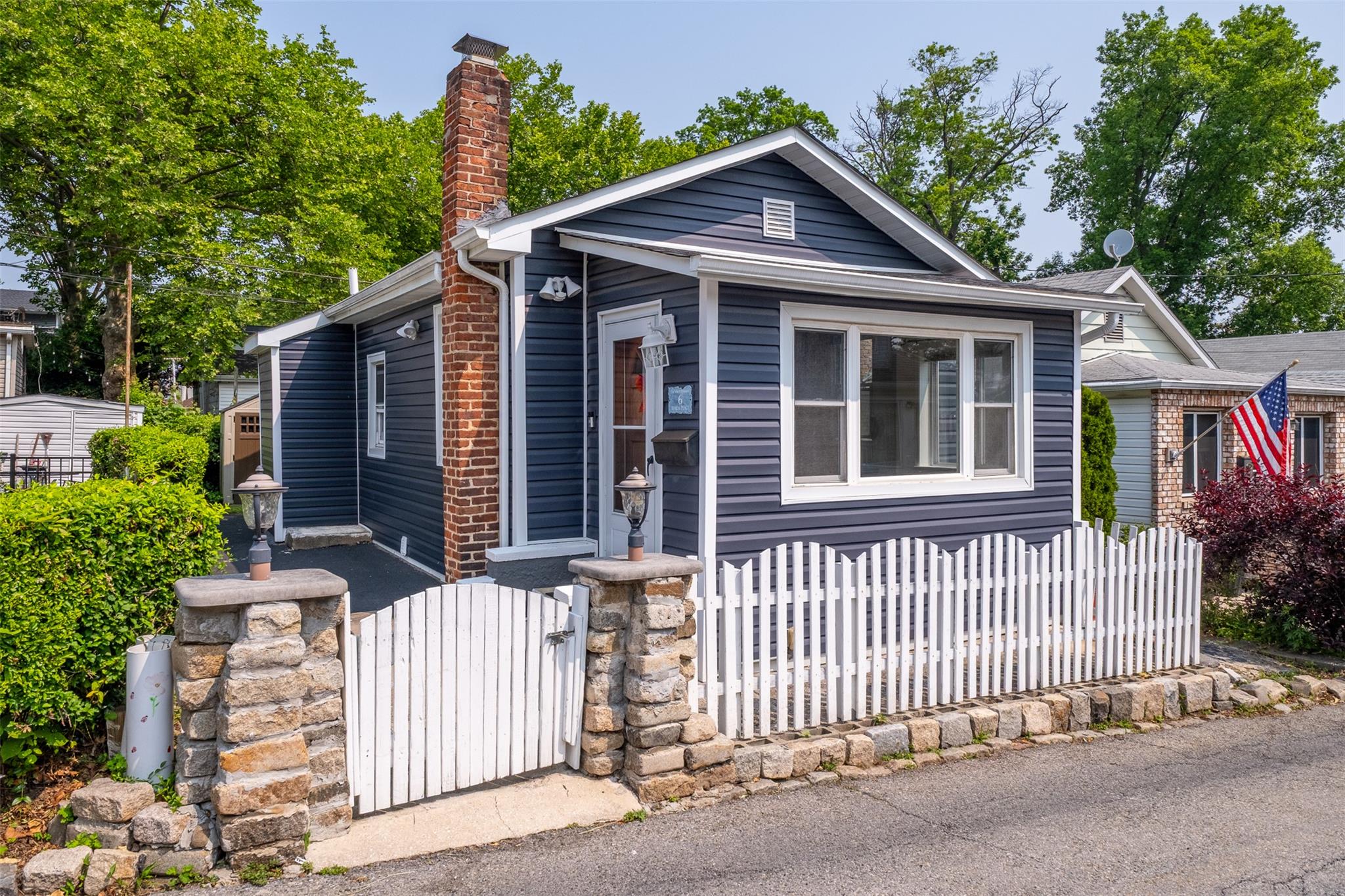 6 Beech Place, Unit 6 Bronx, NY 10465 - Photo 1 of 1 front view of a house with a porch