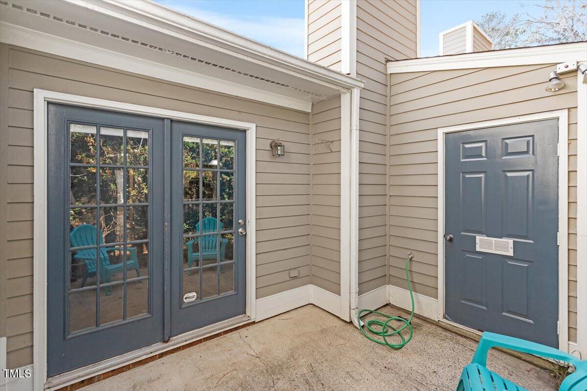 69 Forest Oaks Drive Durham, NC 27705 - Photo 24 of 31 a view of front door and potted plants