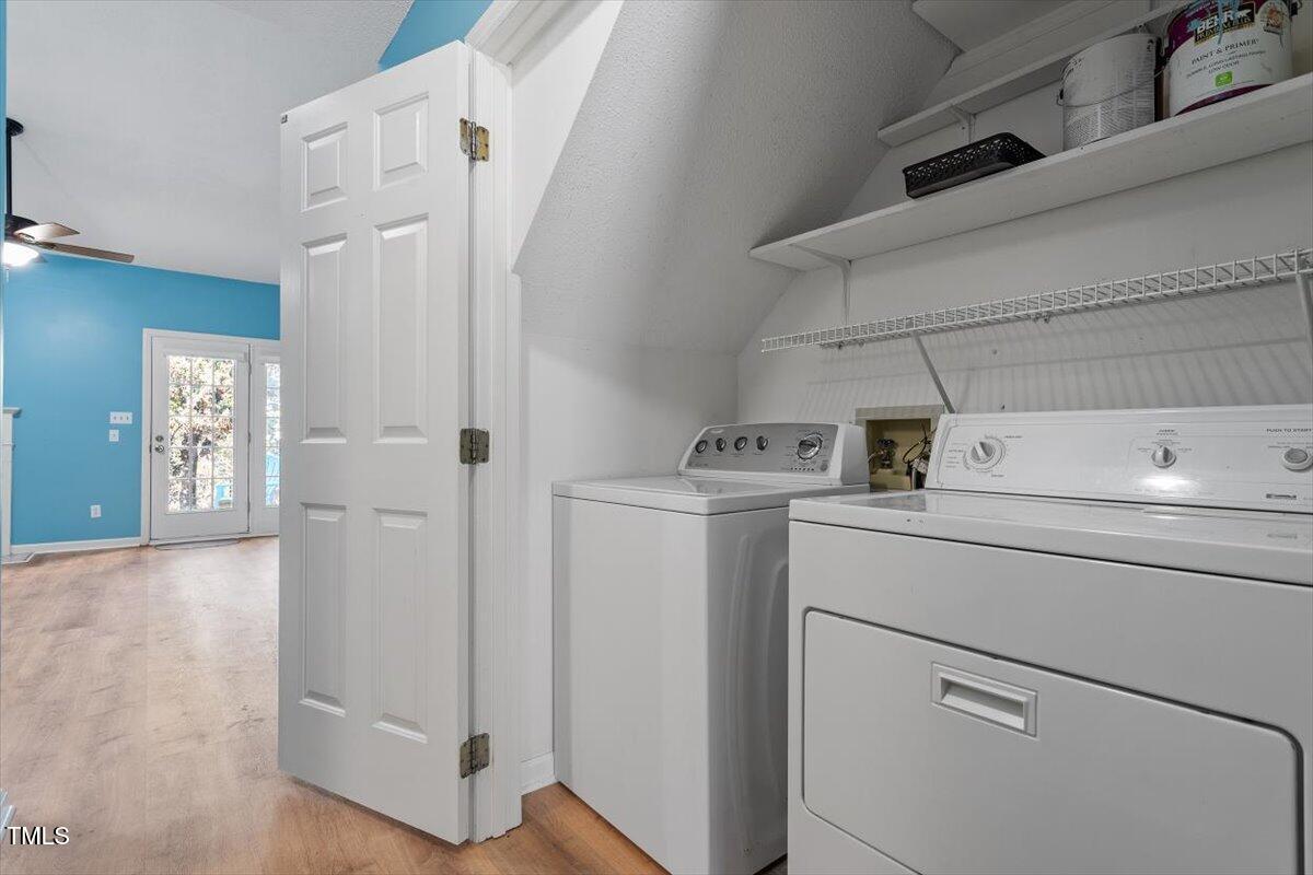 69 Forest Oaks Drive Durham, NC 27705 - Photo 4 of 31 a utility room with dryer and washer