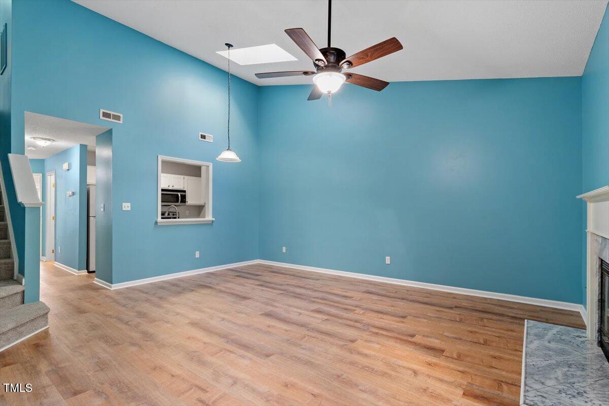 69 Forest Oaks Drive Durham, NC 27705 - Photo 6 of 31 a view of a big room with closet and fan