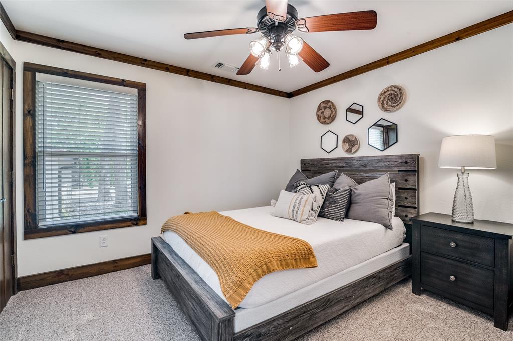 6207 Point Lavista Malakoff, TX 75148 - Photo 21 of 40 a bedroom with a bed and a window