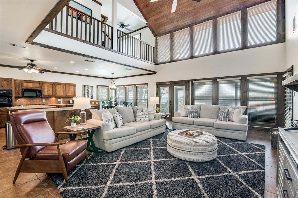 6207 Point Lavista Malakoff, TX 75148 - Photo 3 of 40 a living room with furniture a rug and a table