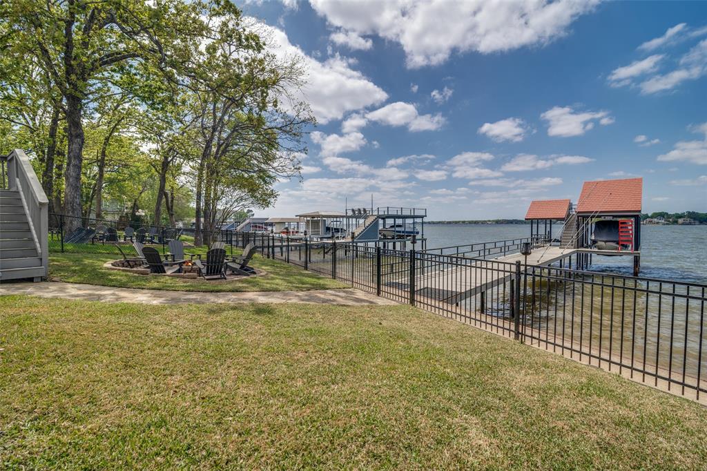 6207 Point Lavista Malakoff, TX 75148 - Photo 34 of 40 a view of a swimming pool with a table and chairs