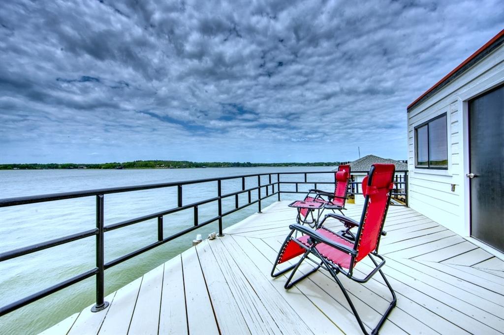 6207 Point Lavista Malakoff, TX 75148 - Photo 35 of 40 a balcony with chairs and wooden floor