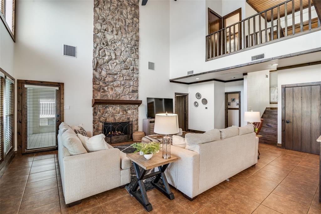 6207 Point Lavista Malakoff, TX 75148 - Photo 5 of 40 a living room with furniture and a fireplace