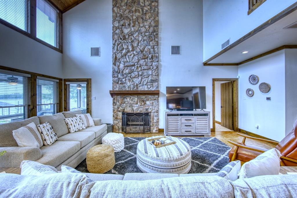 6207 Point Lavista Malakoff, TX 75148 - Photo 5 of 40 a living room with furniture and a fireplace