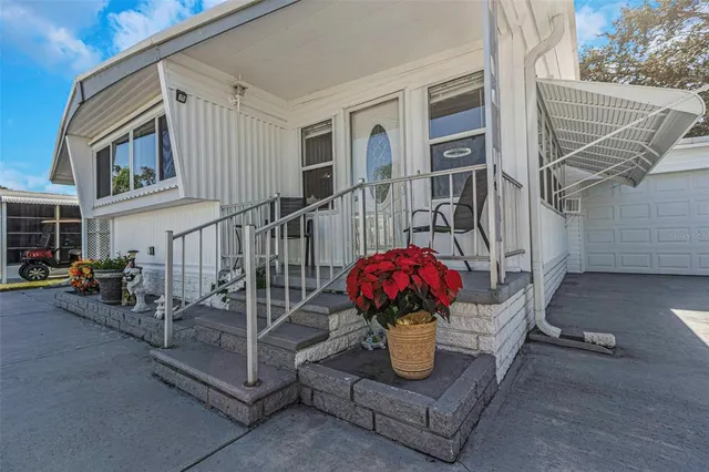 $275,000 | 294 Colonial Boulevard, Unit 48, Palm Harbor, FL 34684