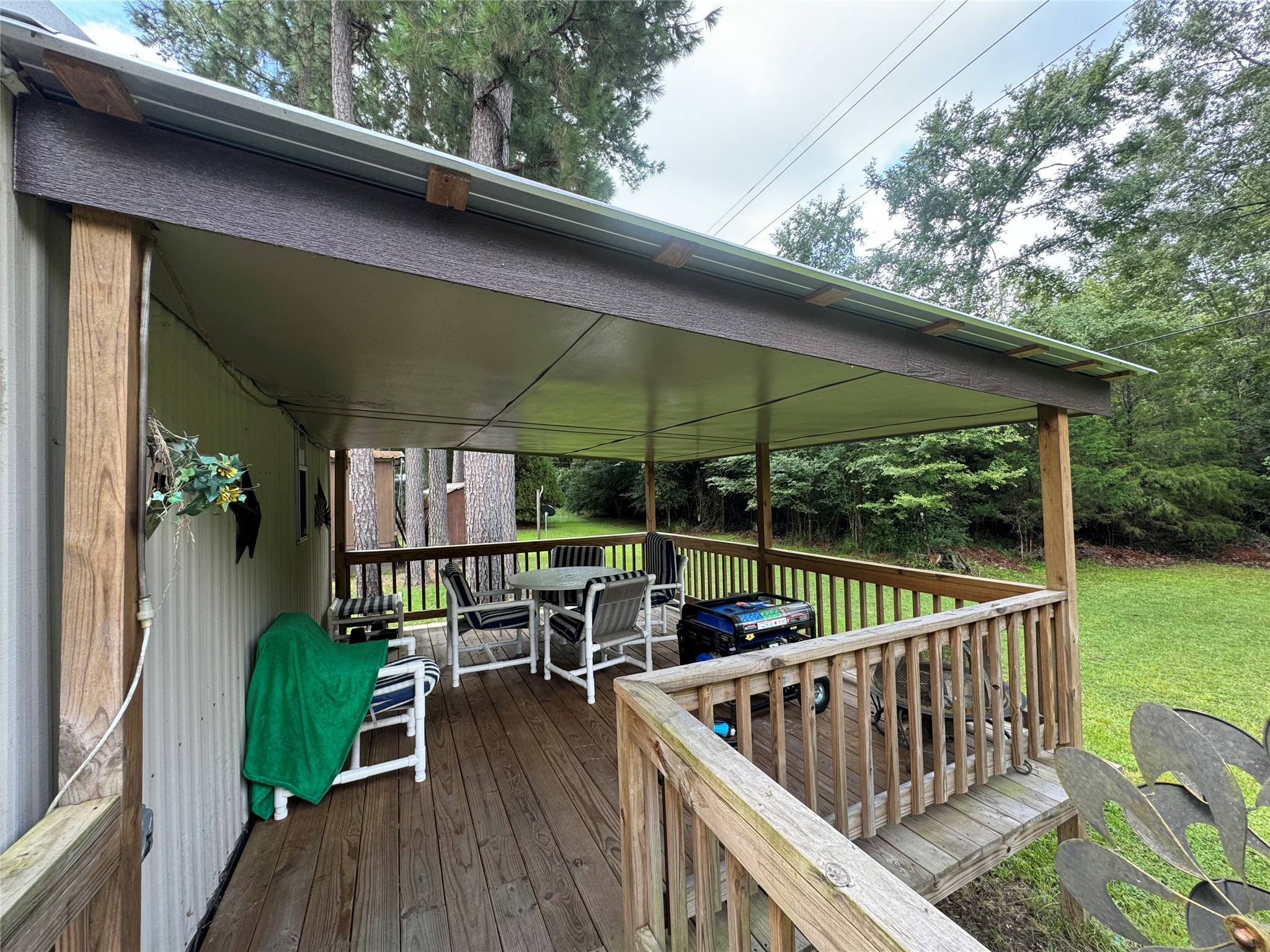 18 Mockingbird Trinity, TX 75862 - Photo 16 of 30 an outdoor view of garden with deck having patio