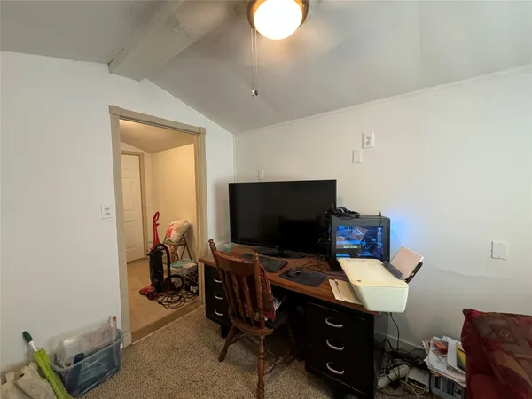 a view of balcony with couch and wooden floor