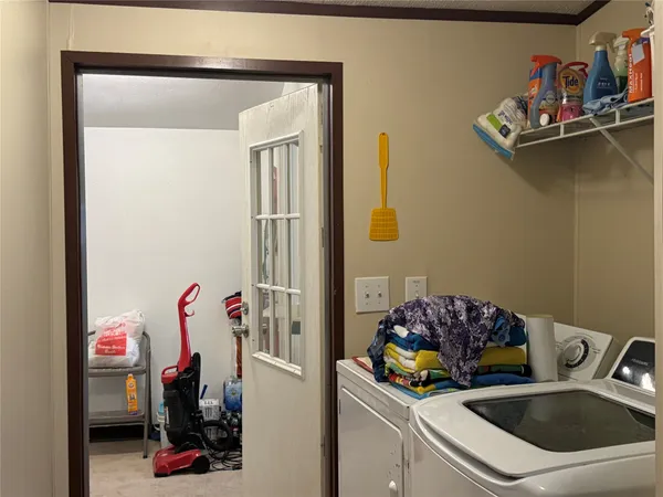 a bathroom with a granite countertop sink and a mirror with toilet