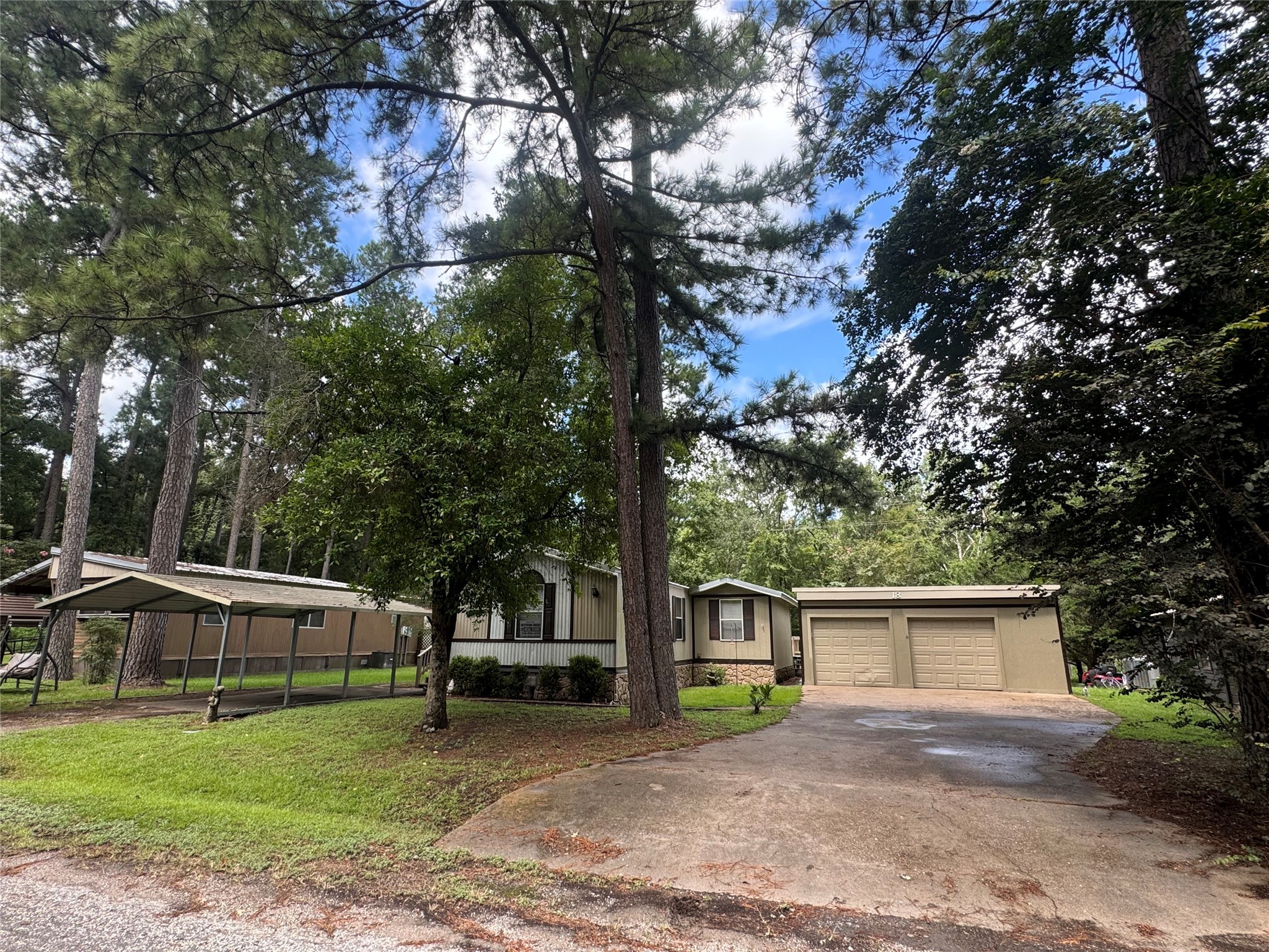 18 Mockingbird Trinity, TX 75862 - Photo 2 of 30 a front view of a house with garden