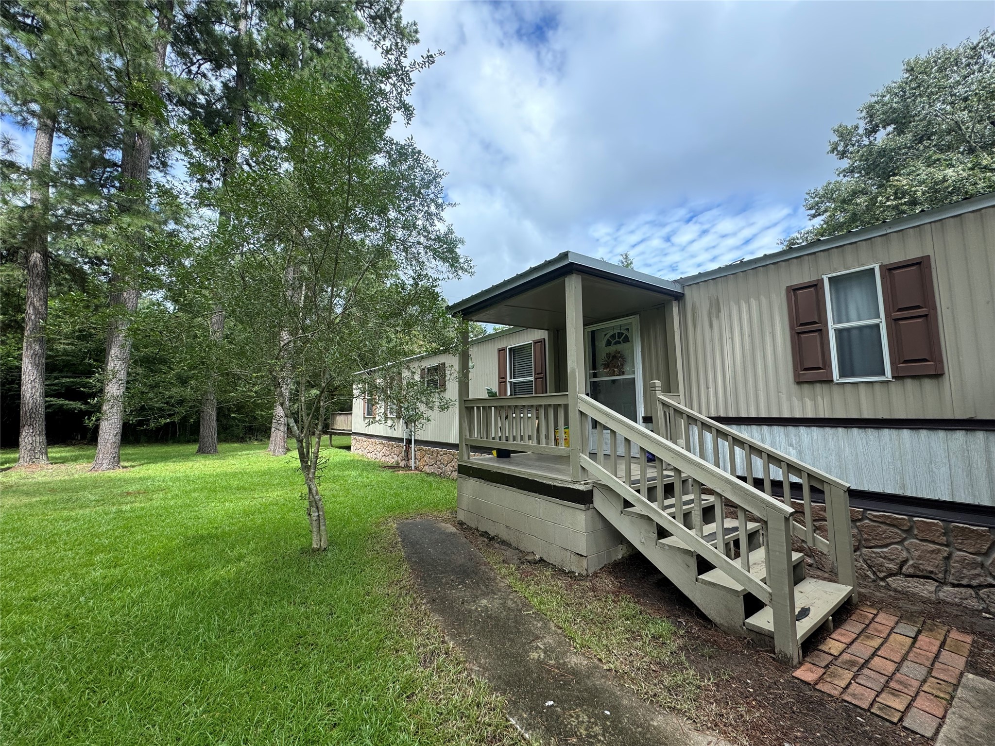 18 Mockingbird Trinity, TX 75862 - Photo 29 of 30 a view of a house with a backyard