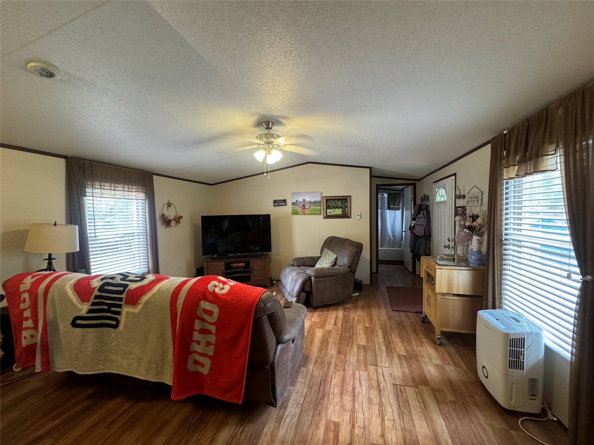 18 Mockingbird Trinity, TX 75862 - Photo 10 of 30 a spacious bedroom with a bed and wooden floor