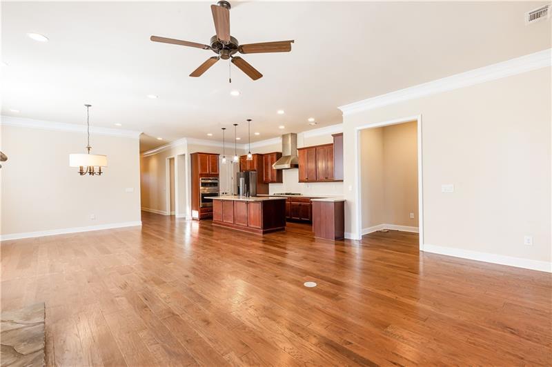 424 Loblolly Street Woodstock, GA 30188 - Photo 14 of 57 a view of empty room with wooden floor