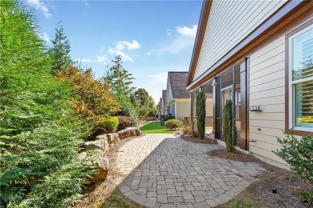 a backyard of a house with lots of green space