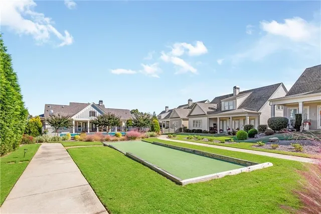 an aerial view of a building with an outdoor space