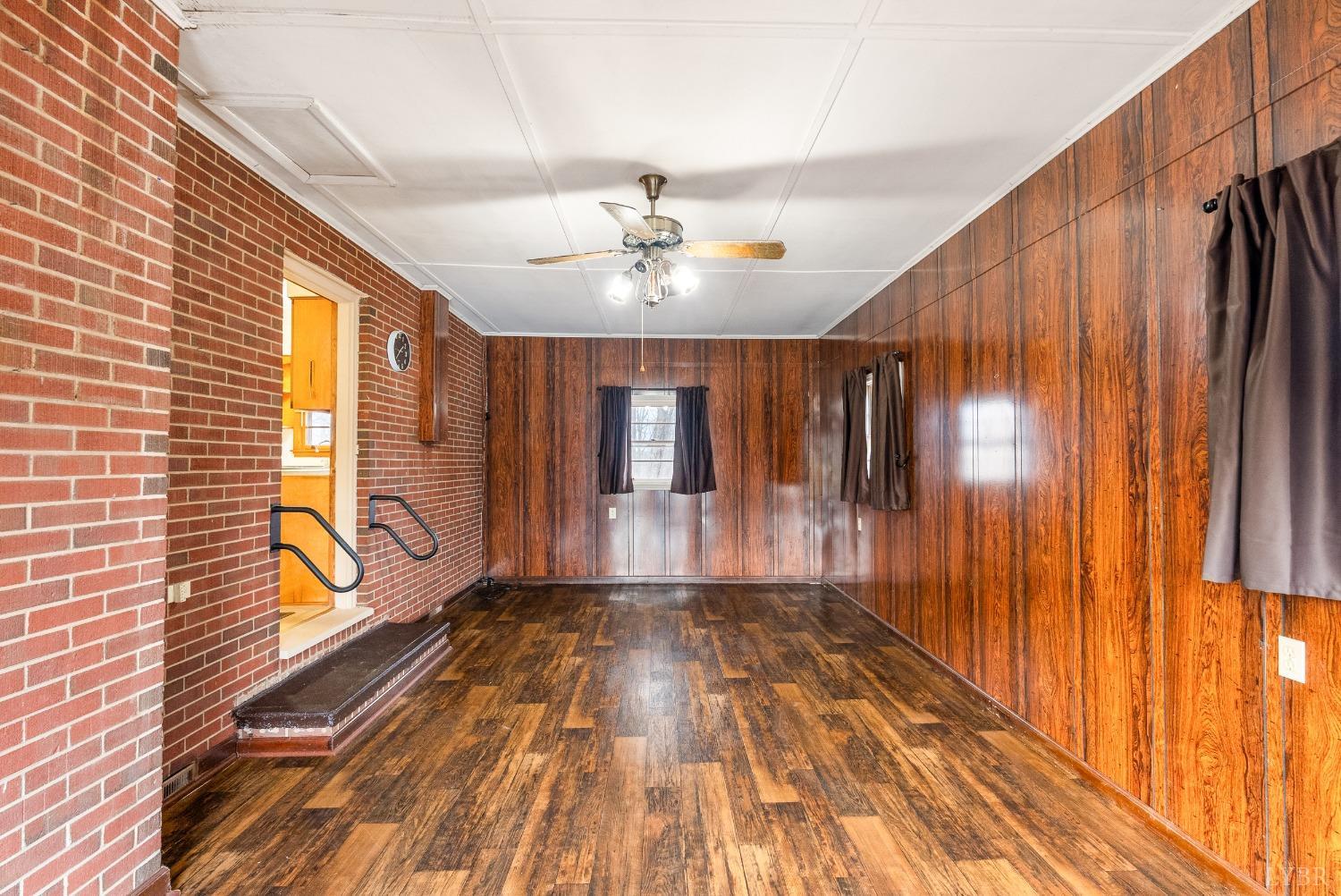 528 Jasper Wood Road Hurt, VA 24563 - Photo 16 of 44 a view of an entryway with wooden floor