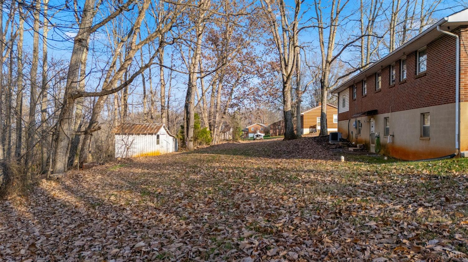 528 Jasper Wood Road Hurt, VA 24563 - Photo 5 of 44 a view of a yard with a house