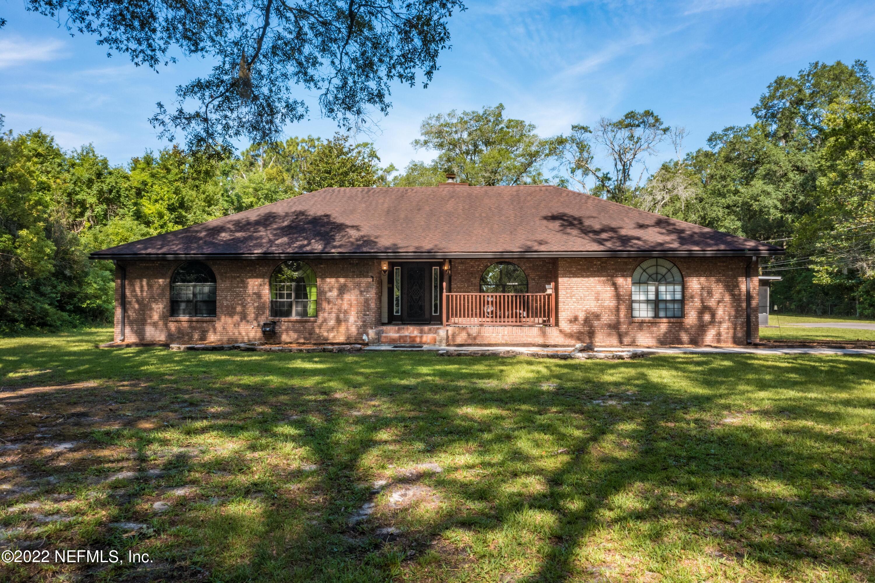 6130 Firestone Road Jacksonville, FL 32244 - Photo 2 of 67 a front view of a house with a garden