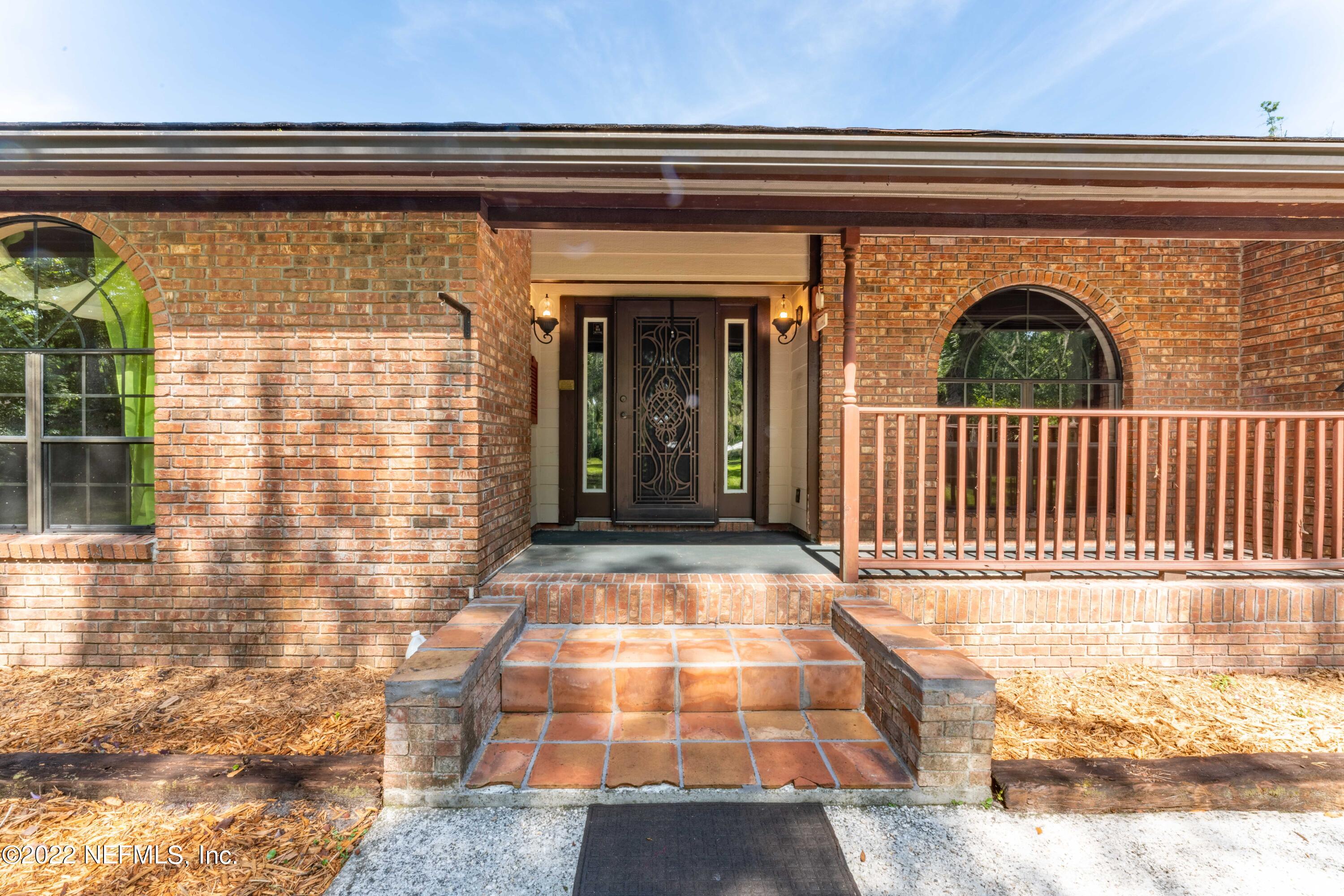 6130 Firestone Road Jacksonville, FL 32244 - Photo 29 of 67 a view of entrance door of the house