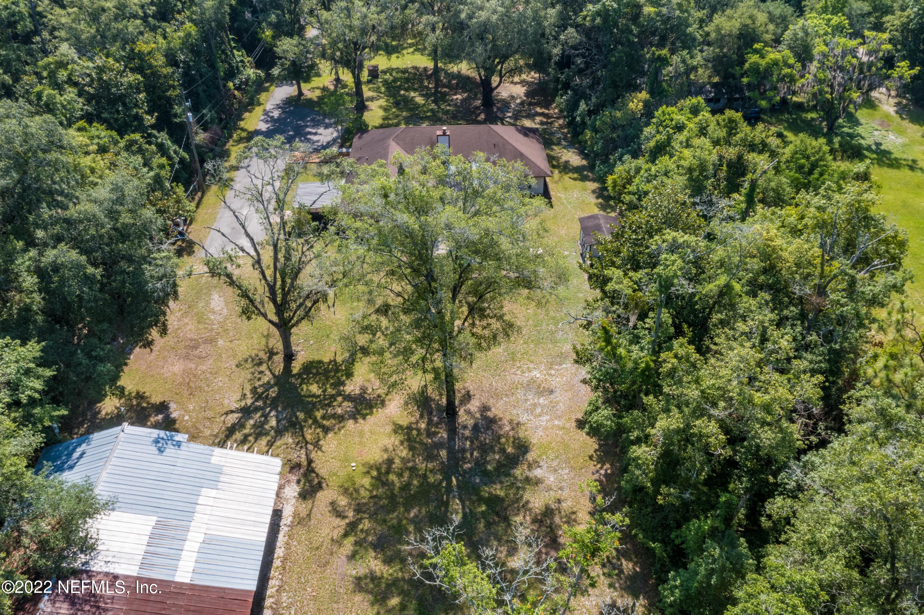 6130 Firestone Road Jacksonville, FL 32244 - Photo 47 of 67 a view of a yard