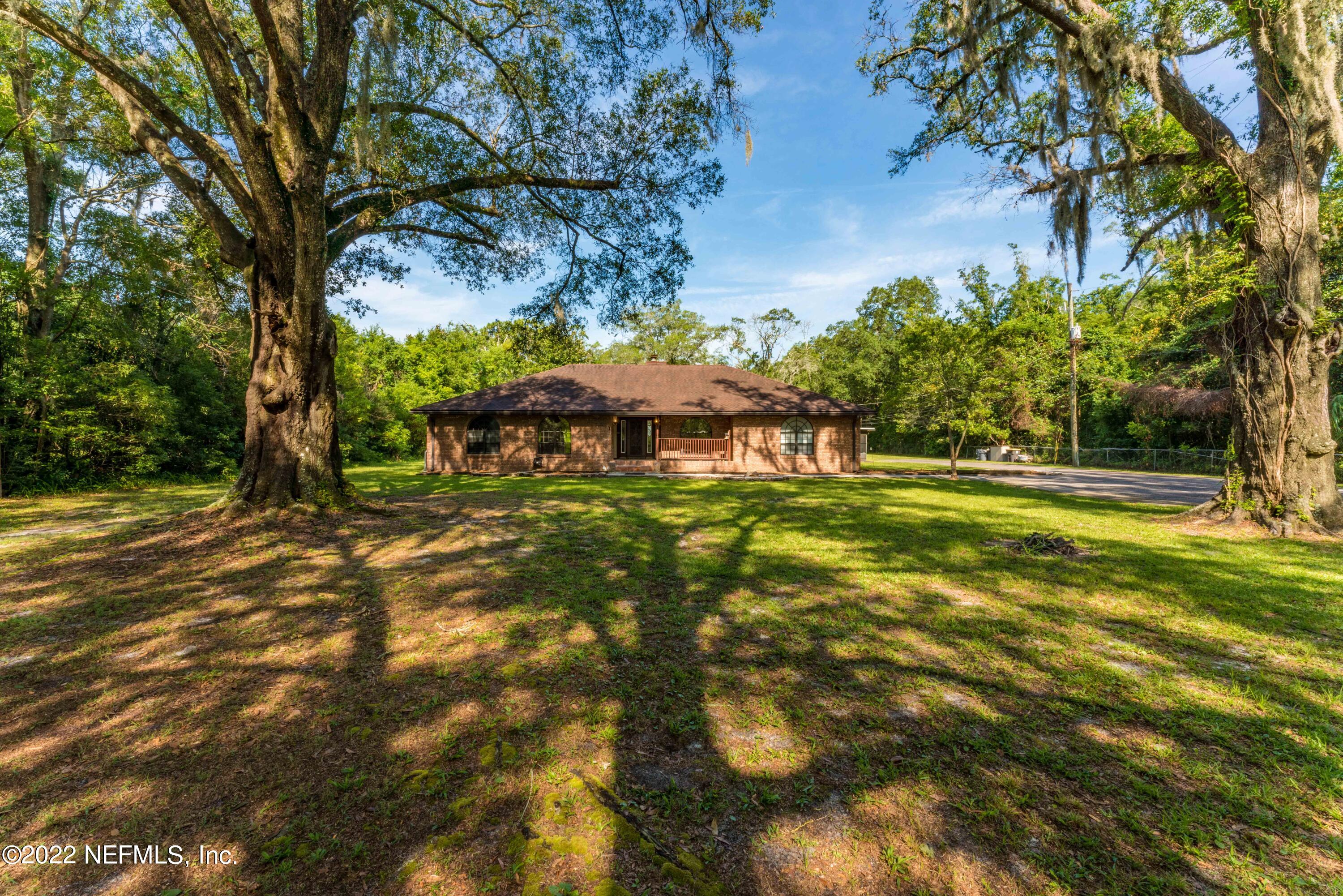 6130 Firestone Road Jacksonville, FL 32244 - Photo 60 of 67 a view of a house with a yard