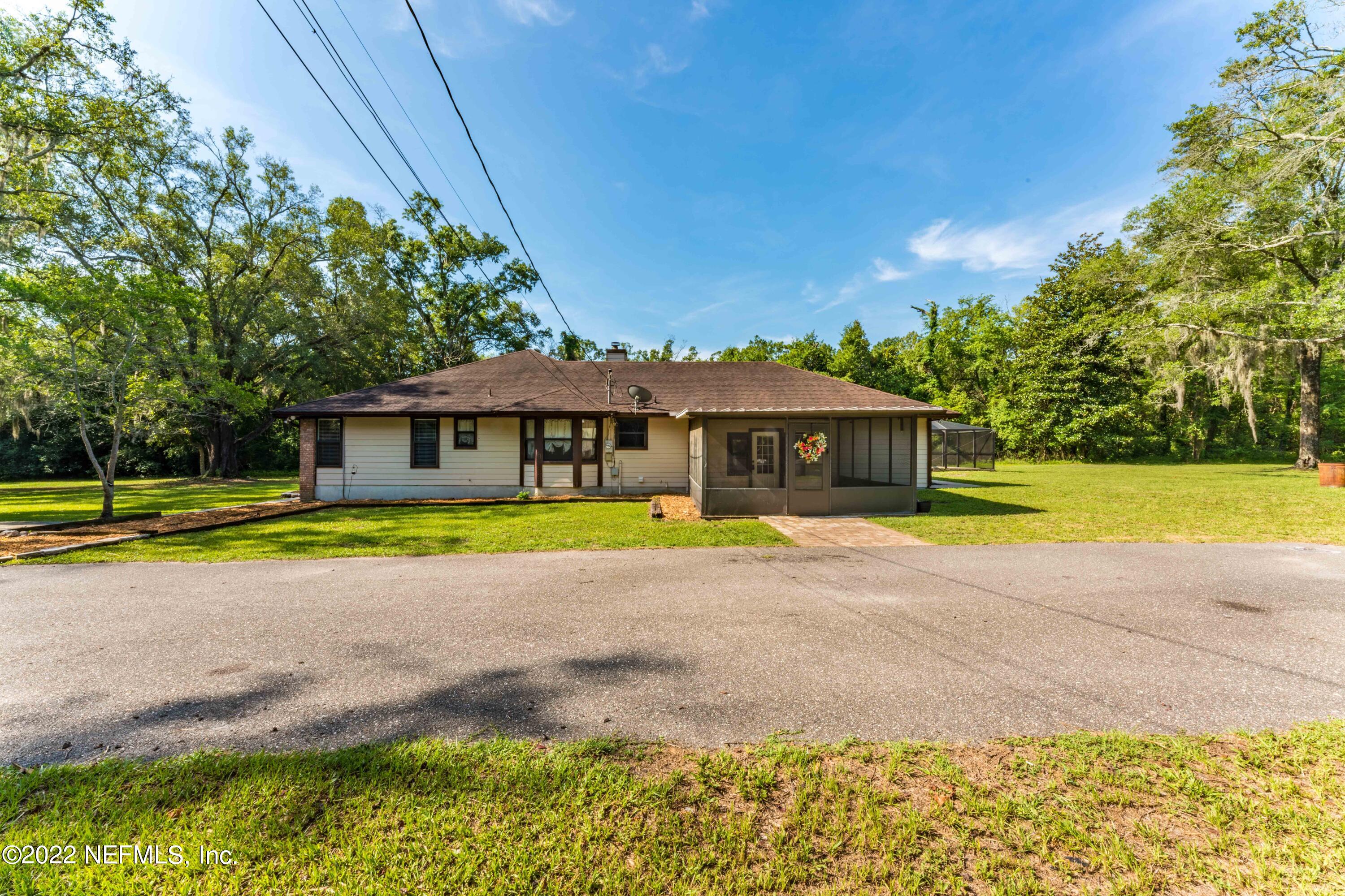 6130 Firestone Road Jacksonville, FL 32244 - Photo 6 of 67 a view of a house with a swimming pool