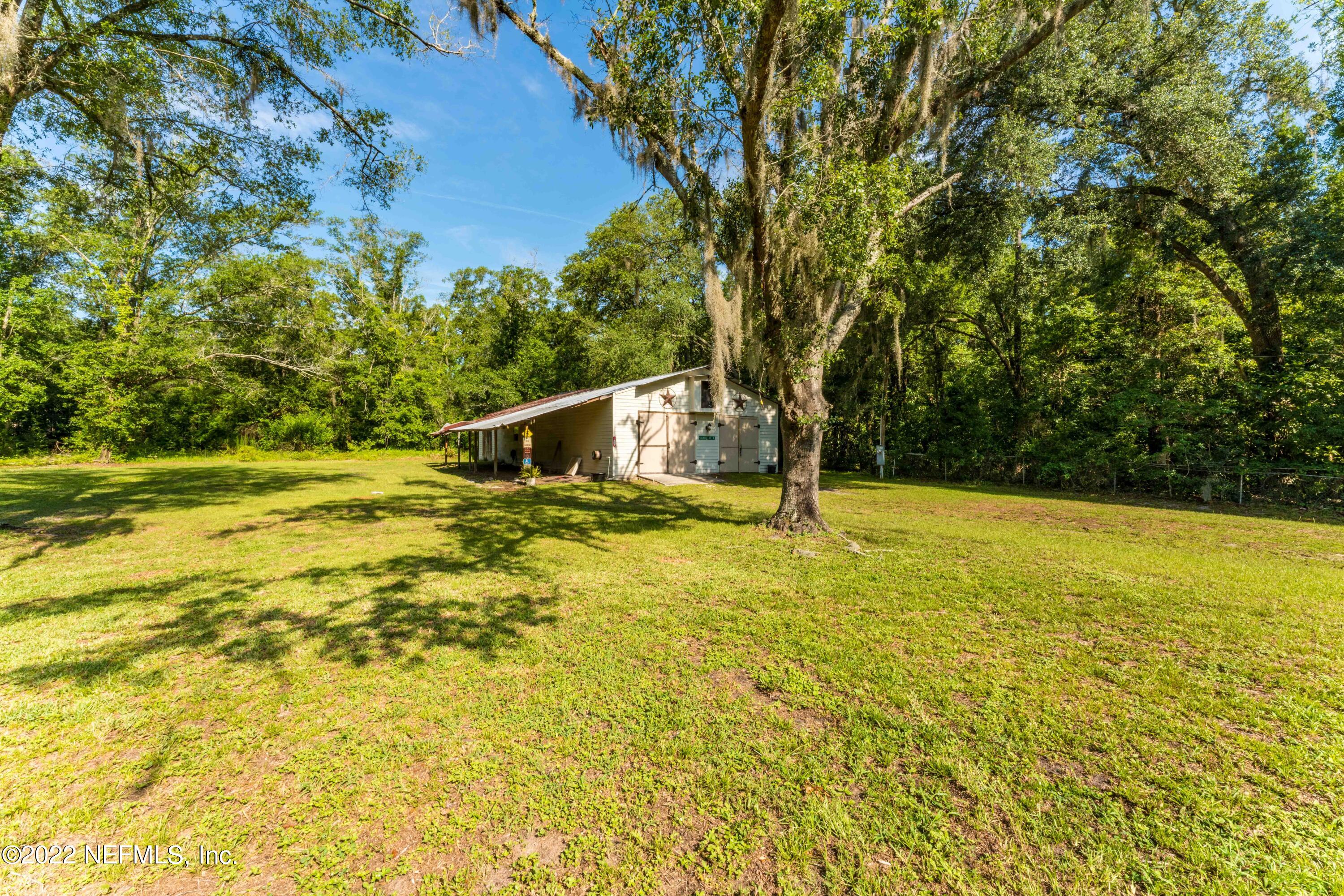6130 Firestone Road Jacksonville, FL 32244 - Photo 8 of 67 a house view with swimming pool in front of the house