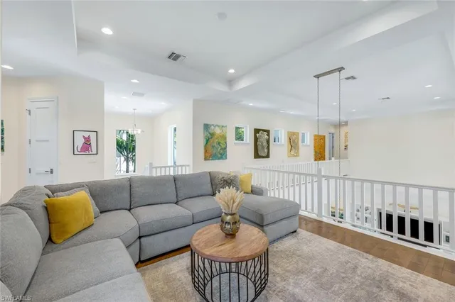 a living room with furniture and a couch