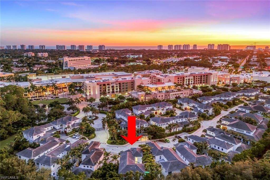 9161 Mercato Way Naples, FL 34108 - Photo 43 of 50 an aerial view of residential houses with city view