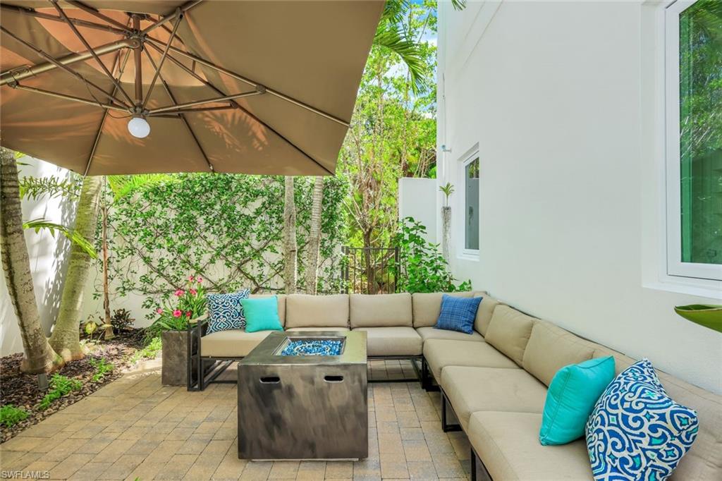 9161 Mercato Way Naples, FL 34108 - Photo 46 of 50 a outdoor living space with furniture and garden