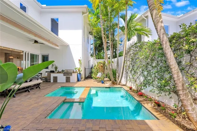 a view of yard with patio