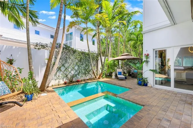 a view of a backyard with a patio