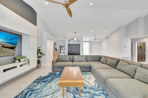 a living room with furniture and a couch