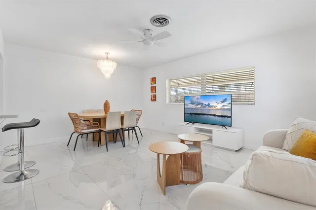 a view of a dining room with furniture