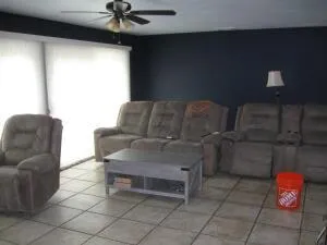 a view of a wooden door and a tree