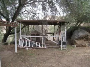 a view of a yard with an outdoor space