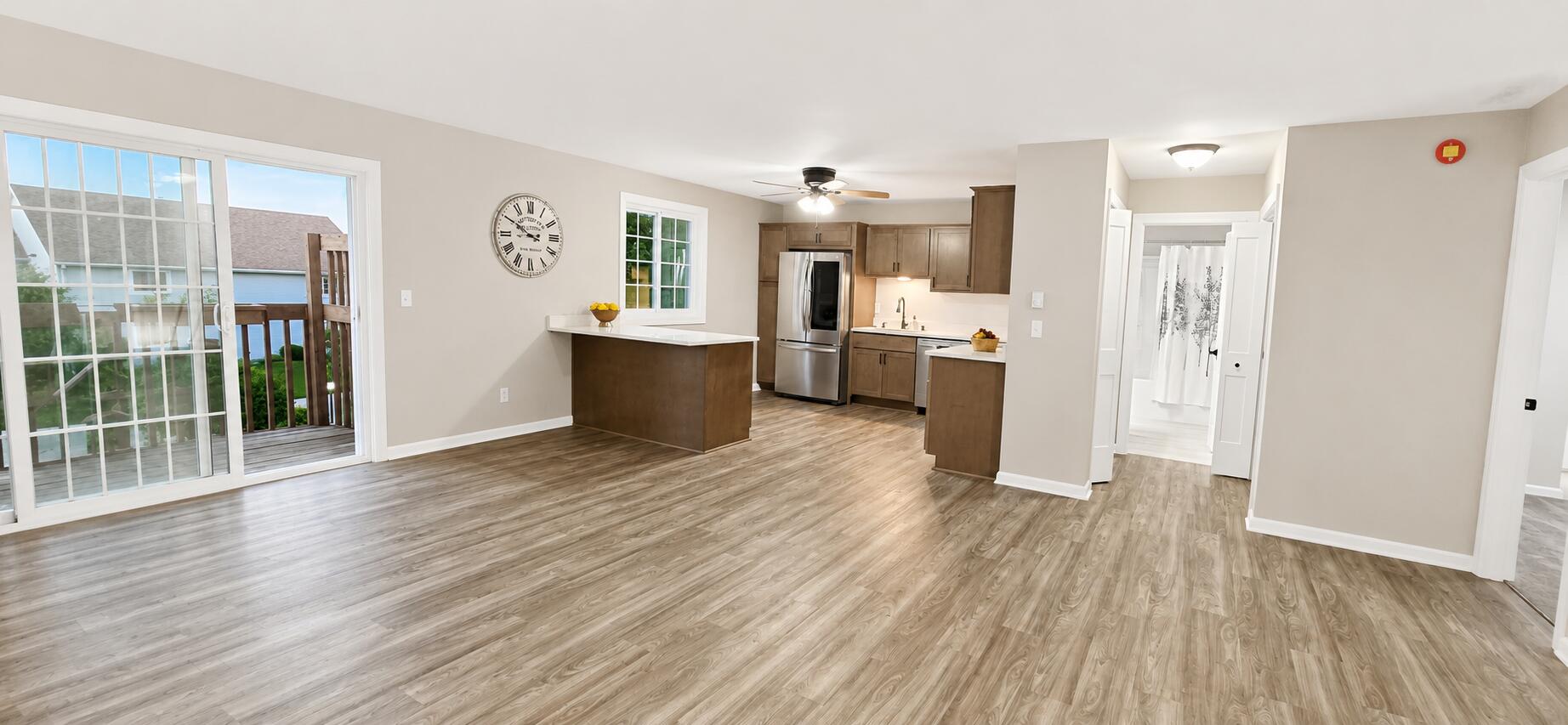 501 Slinger Road, Unit E 2 Slinger, WI 53086 - Photo 2 of 11 Spacious modern open-plan living area
