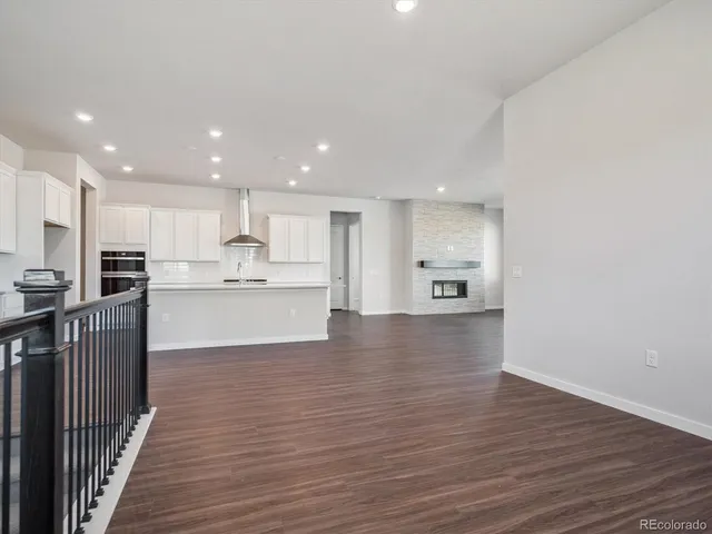 a view of kitchen with wooden floor