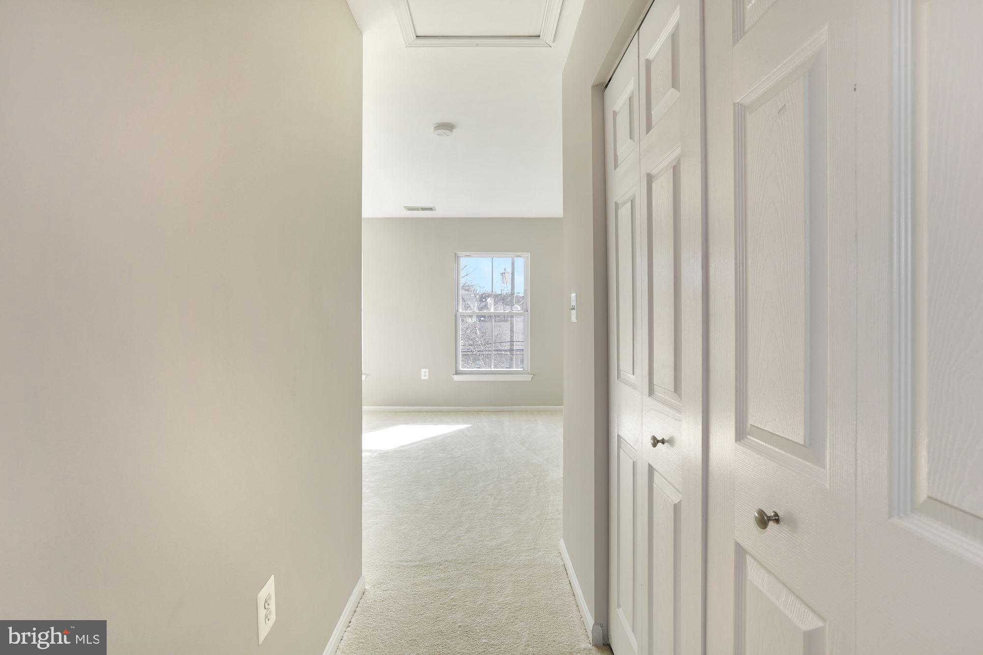 3219 Stanton Road Southeast Washington, DC 20020 - Photo 24 of 33 Breezeway with large closet into Master Suite