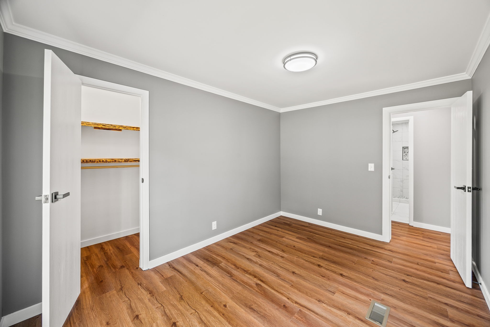 83 Summer Circle Morrison, TN 37357 - Photo 17 of 29 a view of room with wooden floor and bathroom