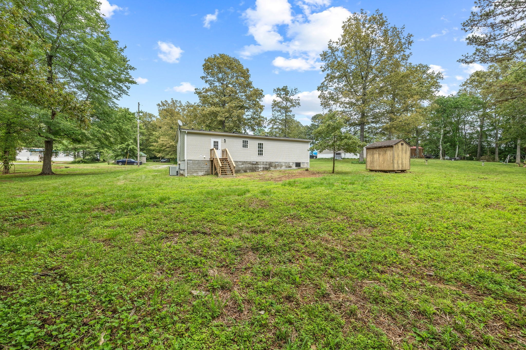 83 Summer Circle Morrison, TN 37357 - Photo 24 of 29 a view of a house with a yard and a house