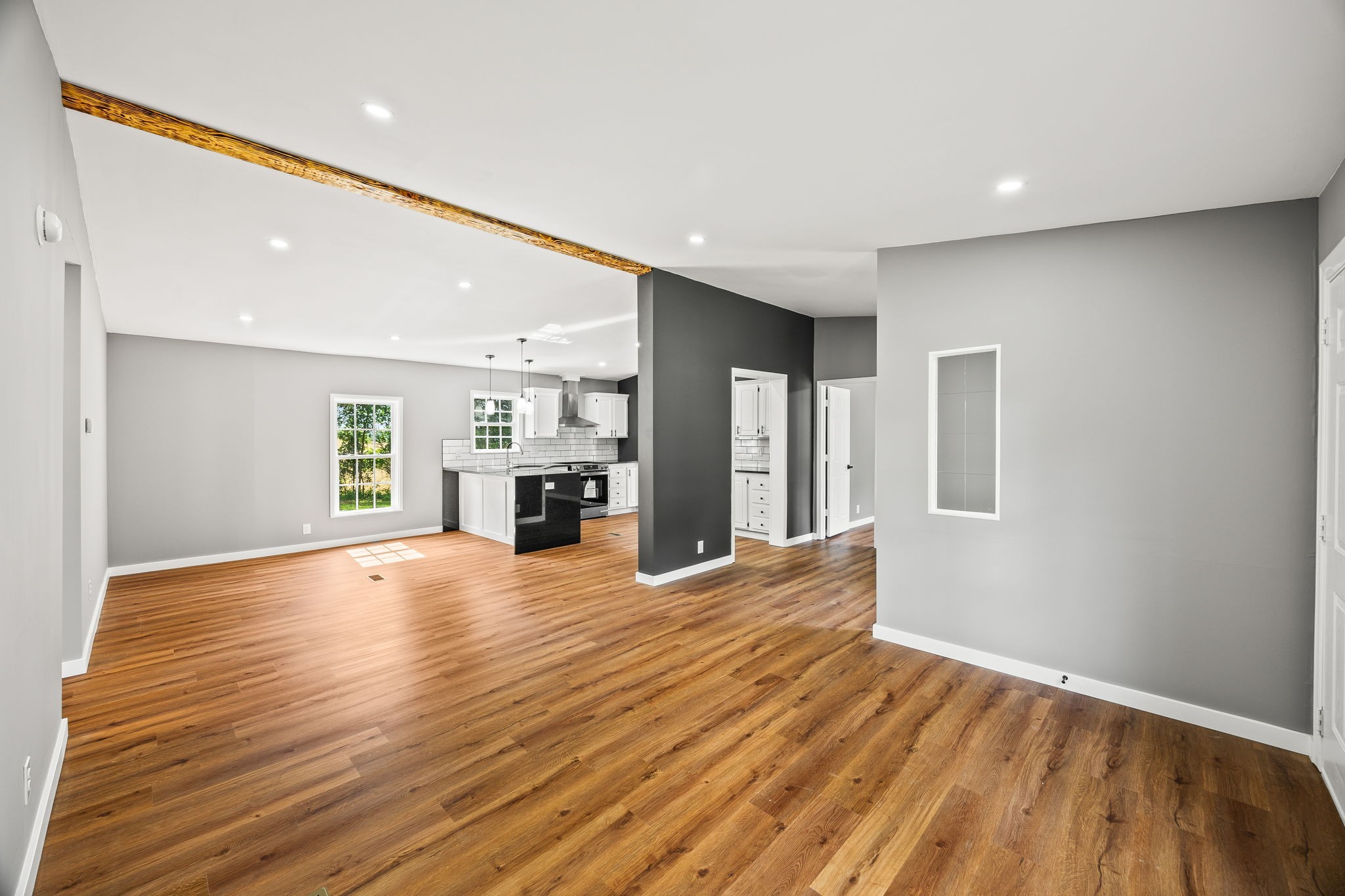 83 Summer Circle Morrison, TN 37357 - Photo 8 of 29 a view of an empty room with wooden floor and a window