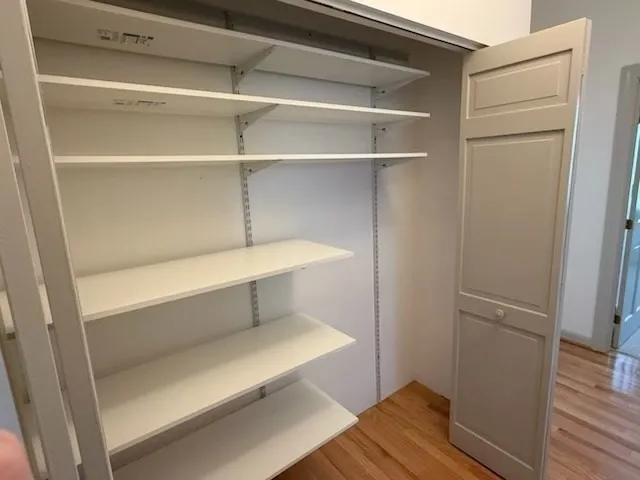 a hallway with closet