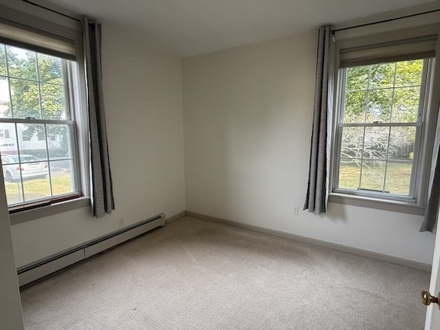 10 River Street, Unit 1 Danvers, MA 01923 - Photo 14 of 17 a view of an empty room and window