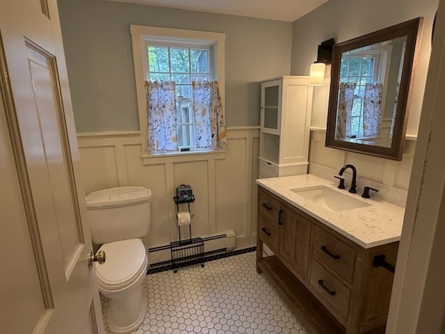 10 River Street, Unit 1 Danvers, MA 01923 - Photo 15 of 17 a bathroom with a granite countertop sink toilet and shower