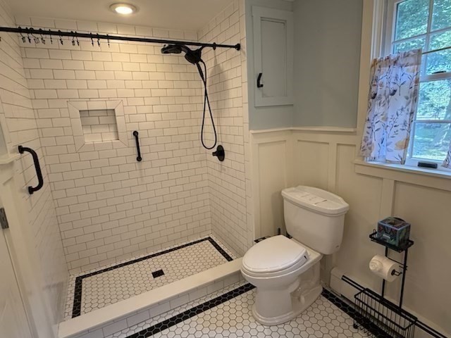 10 River Street, Unit 1 Danvers, MA 01923 - Photo 16 of 17 a bathroom with a toilet and a shower
