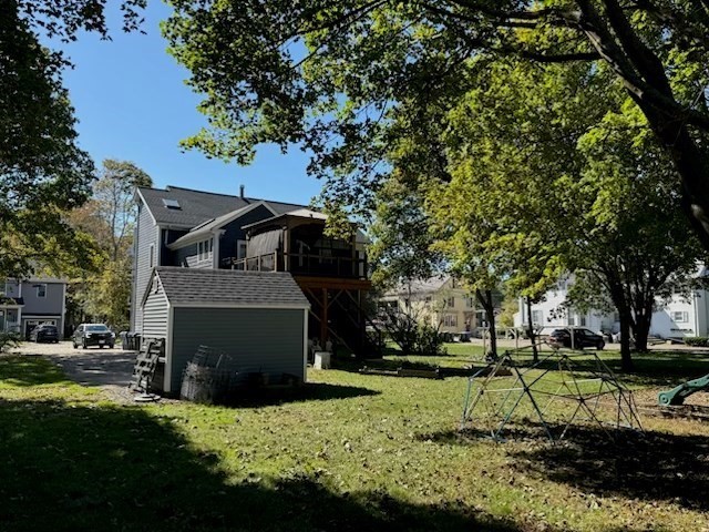 10 River Street, Unit 1 Danvers, MA 01923 - Photo 3 of 17 a view of house with outdoor space and trees