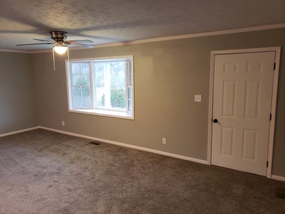 27 Sloan Branch Road Pleasant Shade, TN 37145 - Photo 3 of 35 a view of an empty room with a window
